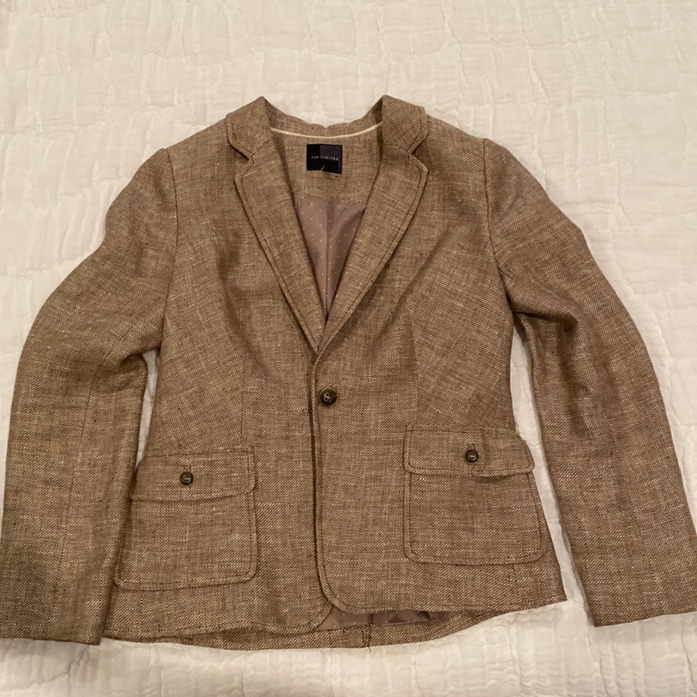 Light brown blazer. Great condition. Perfect with jeans or dressed up.